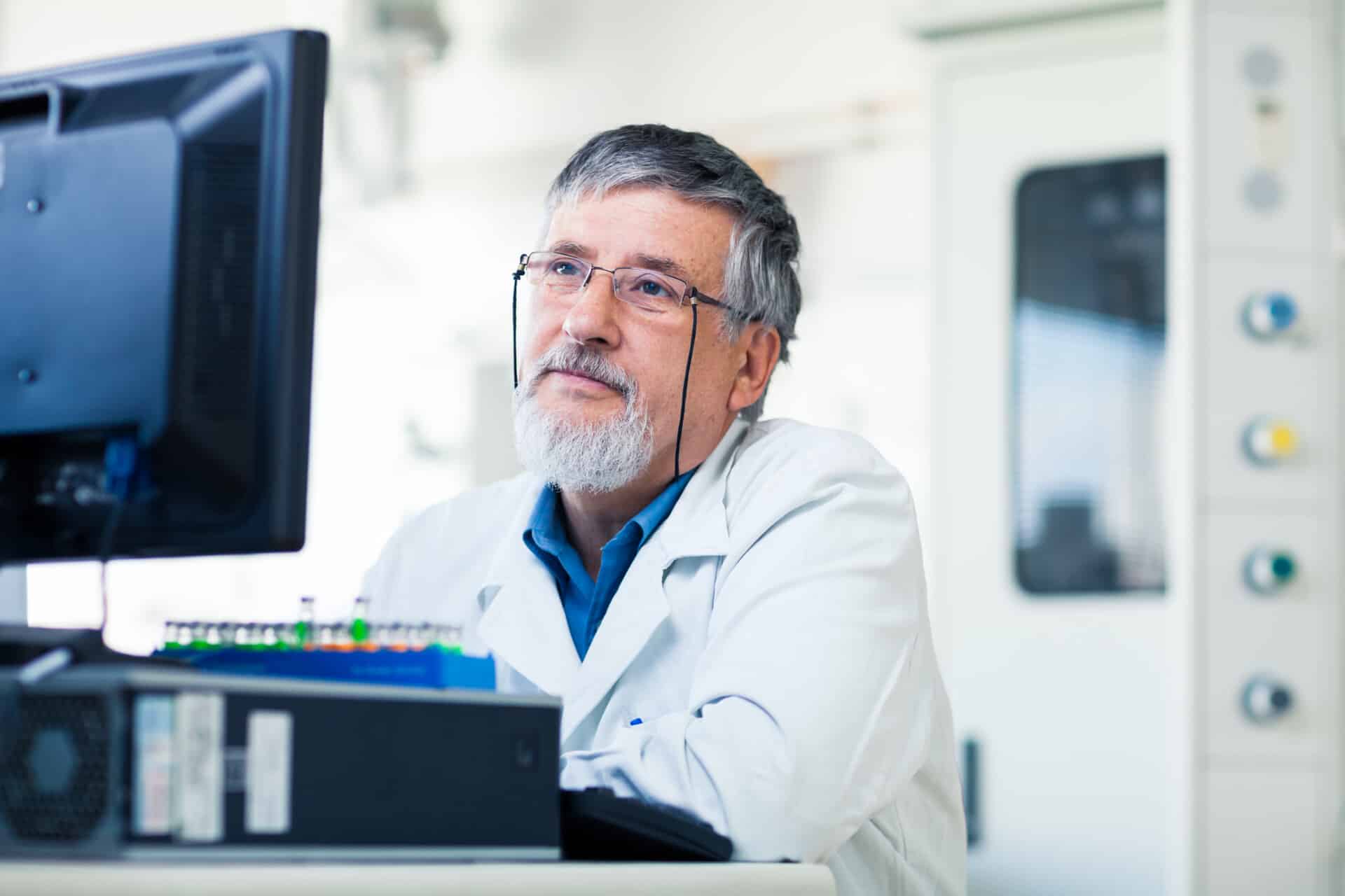 A researcher reviewing an order management portal on a desktop computer