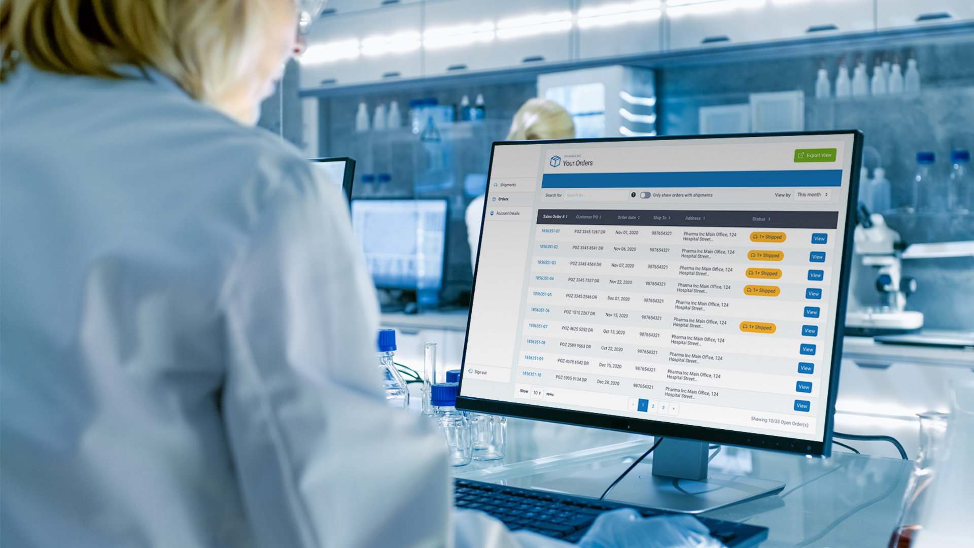 A scientist viewing the Cepheid order management system in a laboratory.